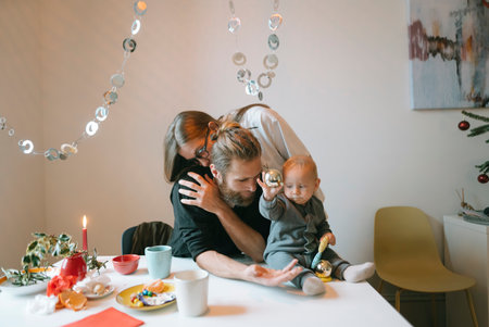 A Heartwarming Family Celebration Featuring a Baby in a Cozy and Inviting Settingの写真素材