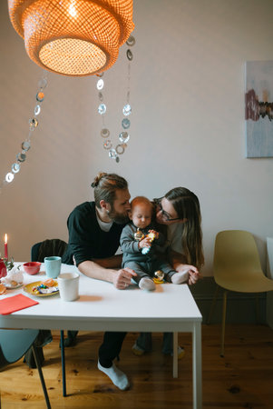 Enjoying Family Bonding Moments at Home with Your Little Baby in a Cozy Atmosphereの写真素材