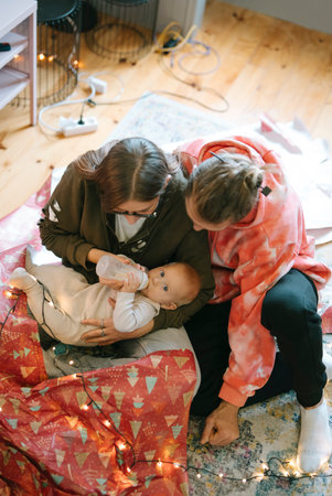 Candid Moments of Care Cherishing Family Bonding with a Precious Baby in our Livesの写真素材