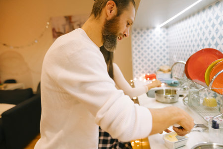 Cooking Together in a Cozy Kitchen Setting, Where Good Food Meets Great Company and Love
