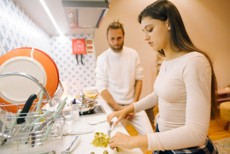 Cooking Together A Couples Culinary Moment in the Kitchen, Creating Delicious Meals Togetherの写真素材