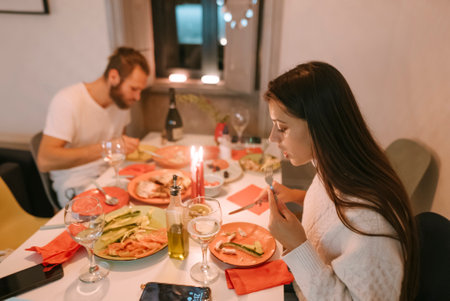 An Intimate Dinner Setting with Delicious Food and a Truly Romantic Atmosphere for Twoの写真素材
