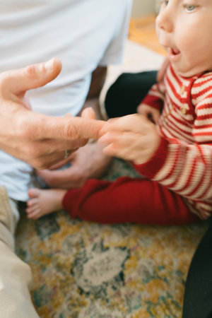 A Joyful and Heartwarming Interaction Between an Adult and a Child, Filled with Love and Laughter