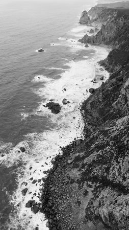 A stunningly majestic coastal landscape captured beautifully in black and white photographyの写真素材