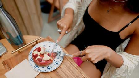 Indulge in a Delicious Dessert Delight Featuring Fresh Fruits at a Charming Cafe Today
