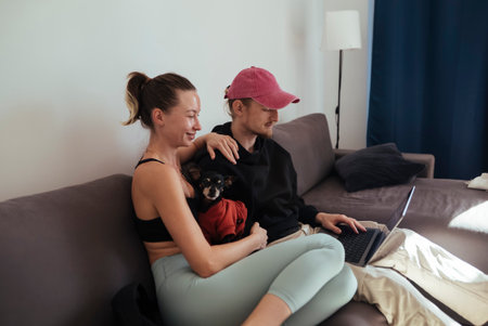 Laughter shared by couple during relaxing evening entertainment