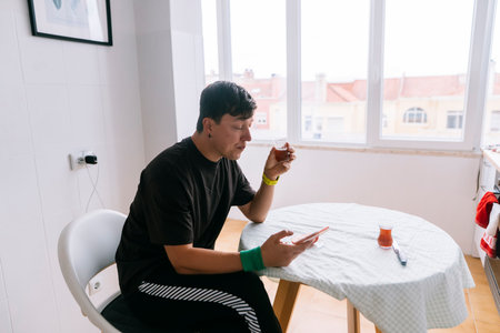 Person actively organizing health routines with toolsの写真素材