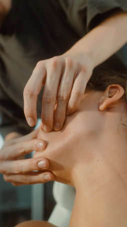 Practitioner applies delicate touch to realign jaw joint