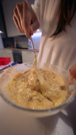 Intimate moment capturing tactile experience of slow cooking and folding