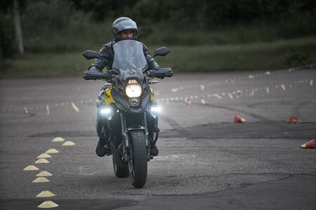 Riga, Latvia - 16.06.2019 Motorcycle gymkhana sport. A biker on a motorcycle. Motorcycling. Open moto fest.のeditorial素材