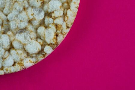 Single rice cake on the red backgroundの写真素材