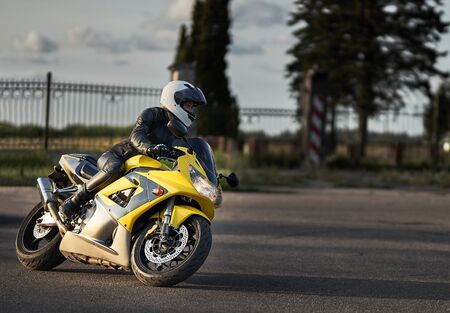 Gymkhana training day. Girl trainings ride motocycle.