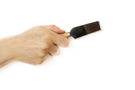 Wooden handle cheese knife isolated on white background.