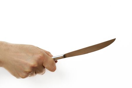 a hand holding a knife isolated on white background
