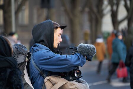 14-08-2018 Riga, Latvia. Man with camera and microphone in his hands