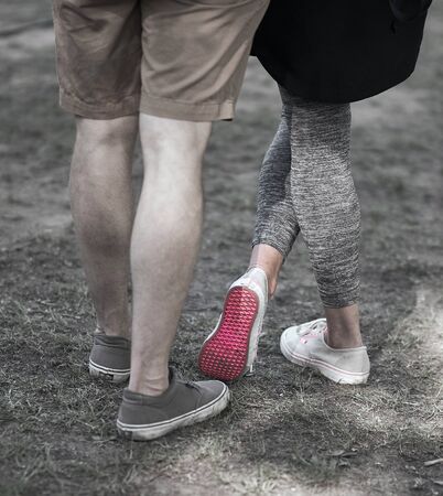 Close up of person walking on streetの写真素材