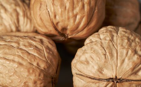 walnut and a cracked walnut closeup shot