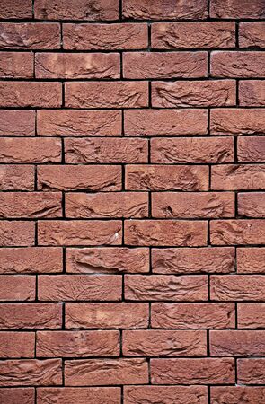 Red vintage bricks wall background. Old building surface.