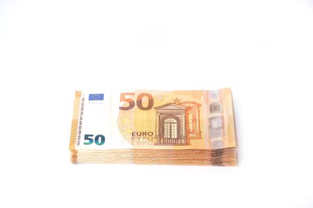 Money laundering on clothesline on light background. 50 eur notes.の写真素材