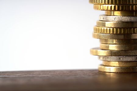 Euro coins stacked on each other in different positions