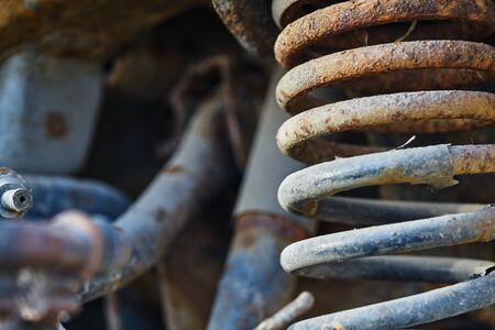 Rusty shock absorber on disassembled car.の写真素材