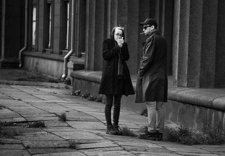 23-04-2020 Riga, Latvia Two young man smoking cigaretes.のeditorial素材