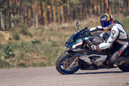 10-05-2020 Ropazi, Latvia Motorcycle practice leaning into a fast corner on track.のeditorial素材