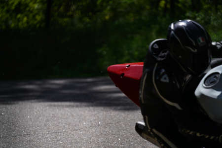 11-05-2020 Riga, Latvia Motorcyclist at sport bike rides by empty asphalt road. sport bike.