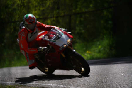 11-05-2020 Riga, Latvia Motorcyclist at sport bike rides by empty asphalt road. sport bike.