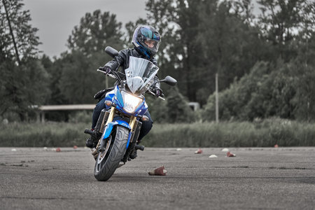 05-09-2020 Riga, Latvia Young man riding a motorcycle.のeditorial素材