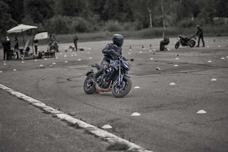 05-09-2020 Riga, Latvia Young man riding a motorcycle.のeditorial素材