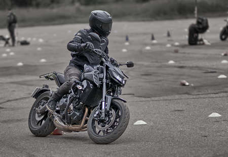 05-09-2020 Riga, Latvia Young man riding a motorcycle.