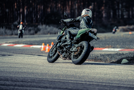 10-05-2020 Ropazi, Latvia Motorcyclist at sport bike rides by empty asphalt road. sport bike.