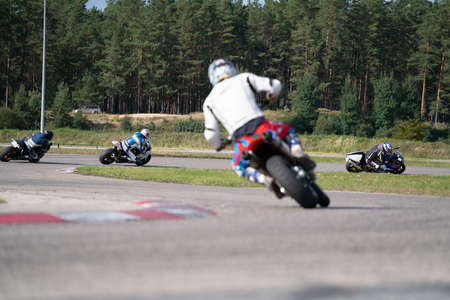 10-06-2020Riga Latvia Motorcycle practice leaning into a fast corner on track.