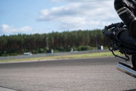 10-06-2020Riga Latvia Motorcycle practice leaning into a fast corner on track.