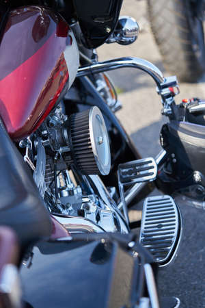 Driving a motorcycle in a sunny day.