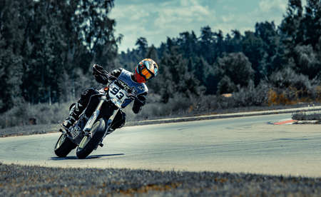 05-08-2020 Riga, Latvia Motard motorcycle in corner of track.のeditorial素材