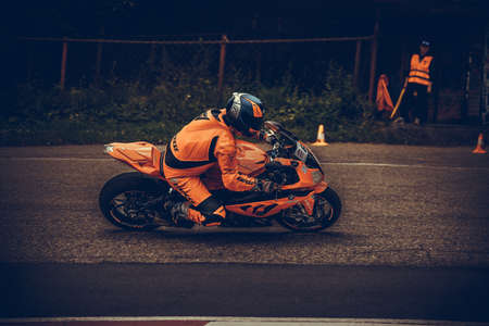 10-09-2020 Ropazi, Latvia Motorcyclist at sport bike rides by empty asphalt road. sport bike.のeditorial素材