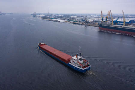02-02-2021 Container ship on the Rhine River, Rhine Valley - UNESCO World Heritage Site, Germany.