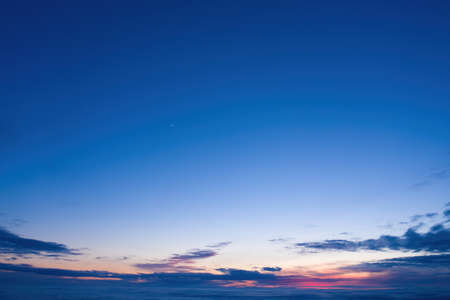 Dusk Sky in the Evening,Amazing Dramatic and Wonderful Cloud on Twilight,Majestic Dark Blue Sky Nature Background,Colorful Cloud on Sunset,Idyllic Dusk peaceful sunlight on nightfall.の写真素材
