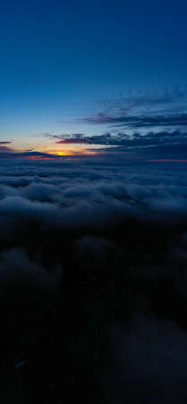 sunrise on blue sky. Blue sky with some clouds.の写真素材