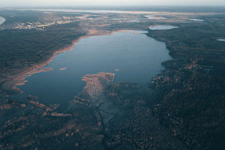 Beautiful Sunrise Sunset over Calm Lake. Aerial view of lakeの写真素材