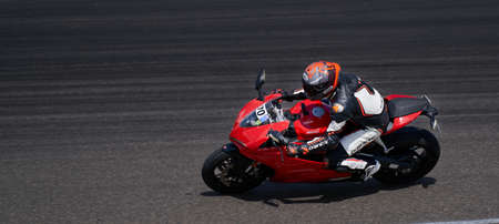 Lithuania, 05-06-2021 Fast red Italian Motorcycle at speed.のeditorial素材