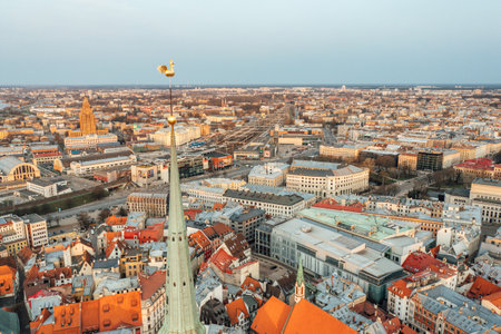 RIga rooftop view panorama at sunset with urban architectures and Daugava River.の写真素材