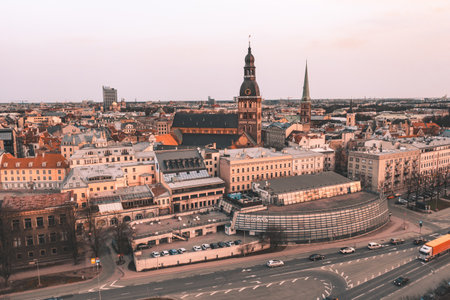 RIga rooftop view panorama at sunset with urban architectures and Daugava River.の写真素材