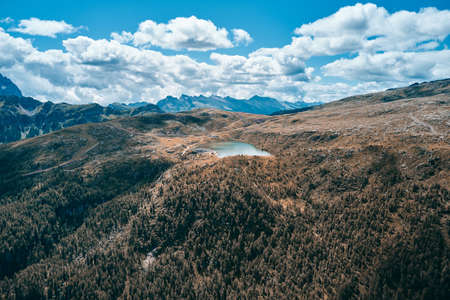 Beautiful mountain lake in nature valley at summerの写真素材