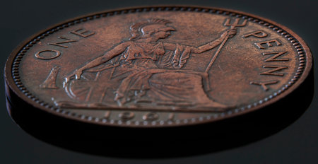 A closeup shot of a coin with the image of a female warriorの写真素材