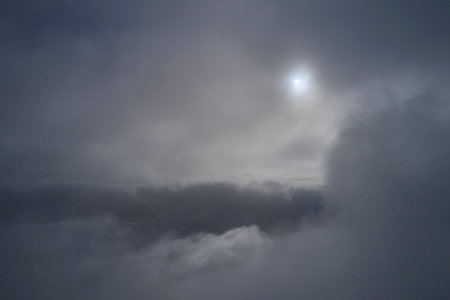 The sun shines through the clouds. The sun shines through the clouds.の写真素材