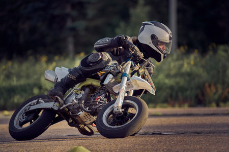 19-09-2021 Riga, Latvia A young man riding a motorcycle on an open road.のeditorial素材
