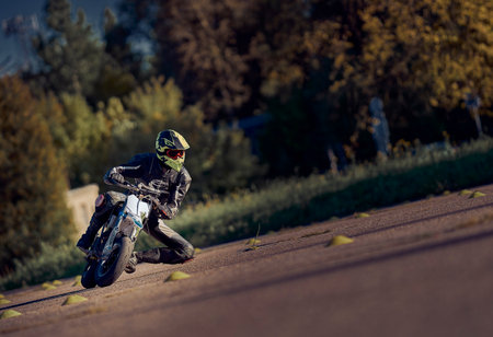 19-09-2021 Riga, Latvia A young man riding a motorcycle on an open road.のeditorial素材